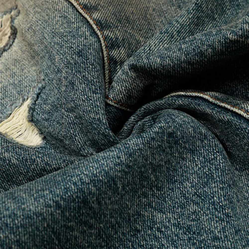 Vintage Mud-Dyed Distressed Barrel Jeans